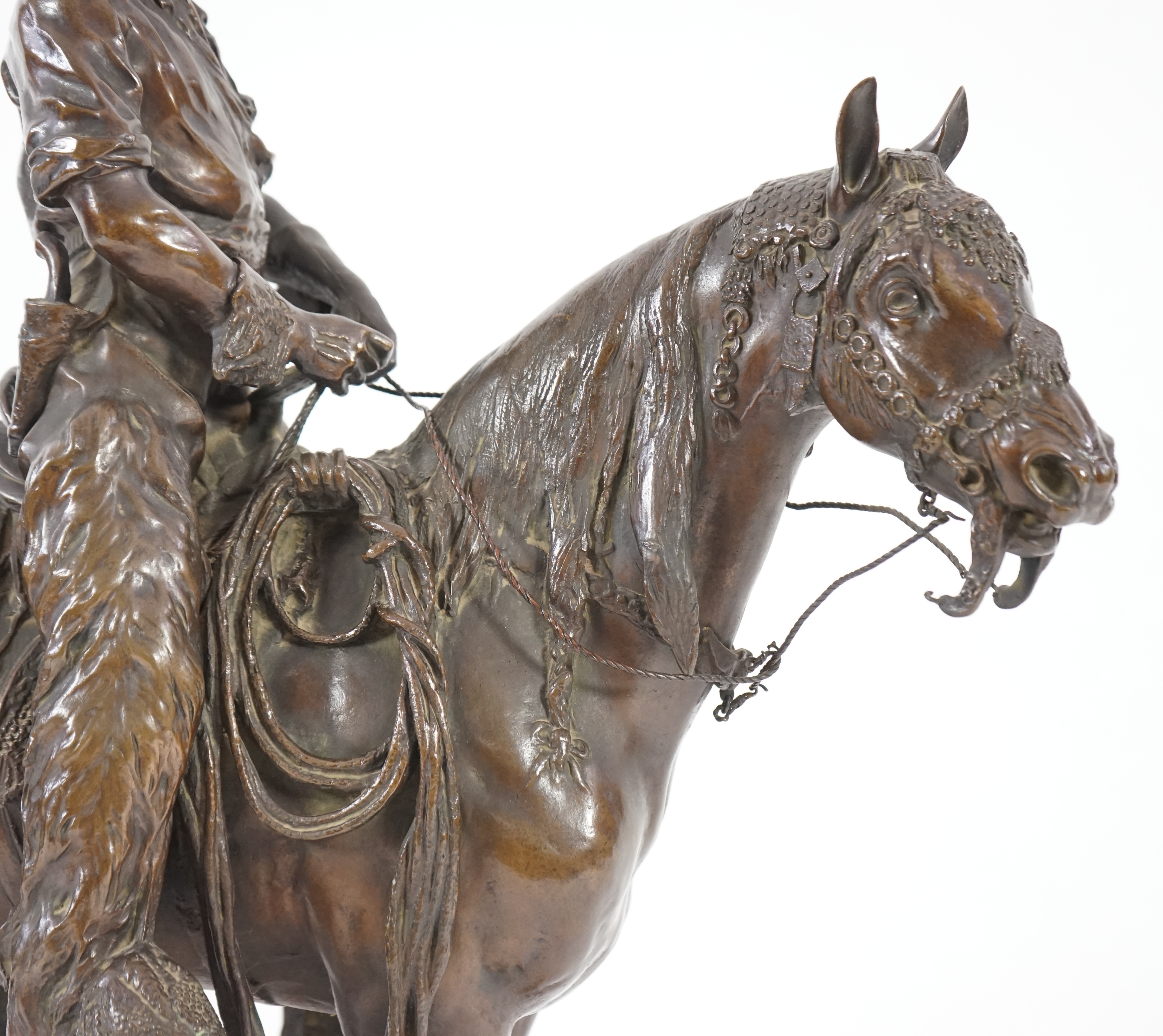 Walter Winans (St. Petersburg, 1852-Parsloe Park, Essex, 1920), a cast bronze of the artist, as a cowboy, riding the Arab stallion Skowronek, 50cm wide, 66cm high, overall 79.5cm high